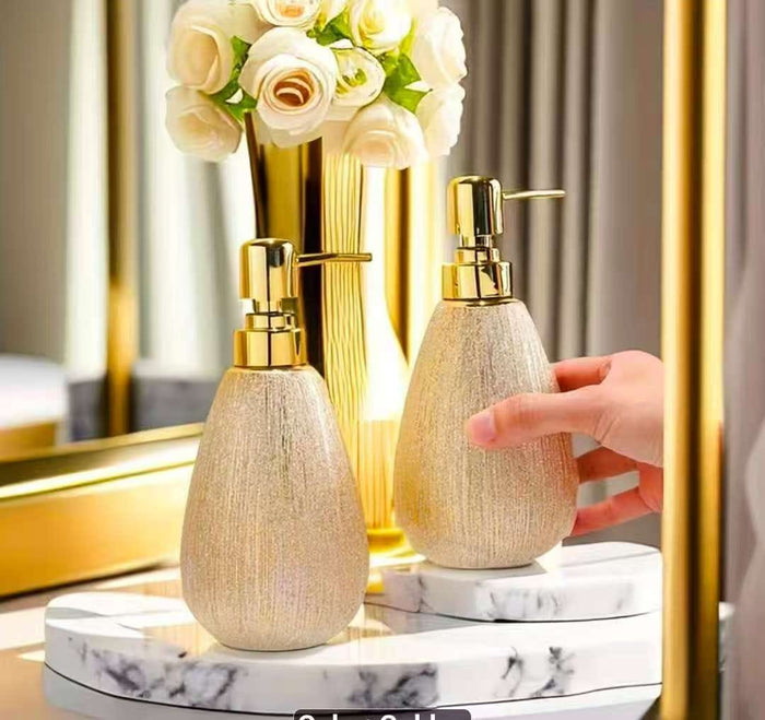 Golden ceramic press bottle dispenser for soap, lotion and shampoo, available in Nairobi, Kenya