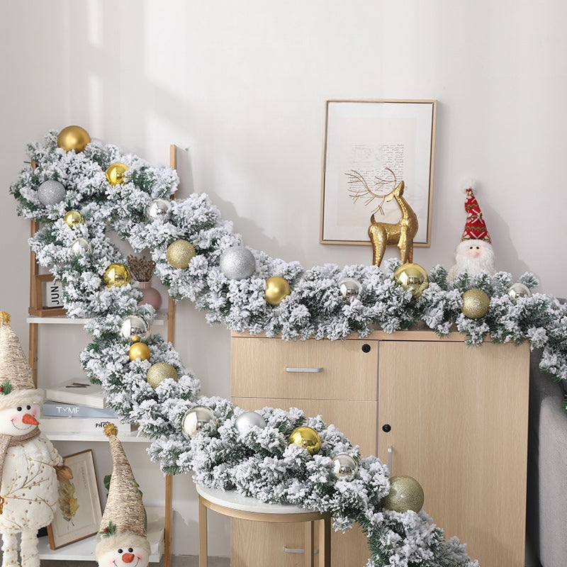 2.7m artificial Christmas pine garland with green branches, snow flocking and included decorations, available in Nairobi, Kenya