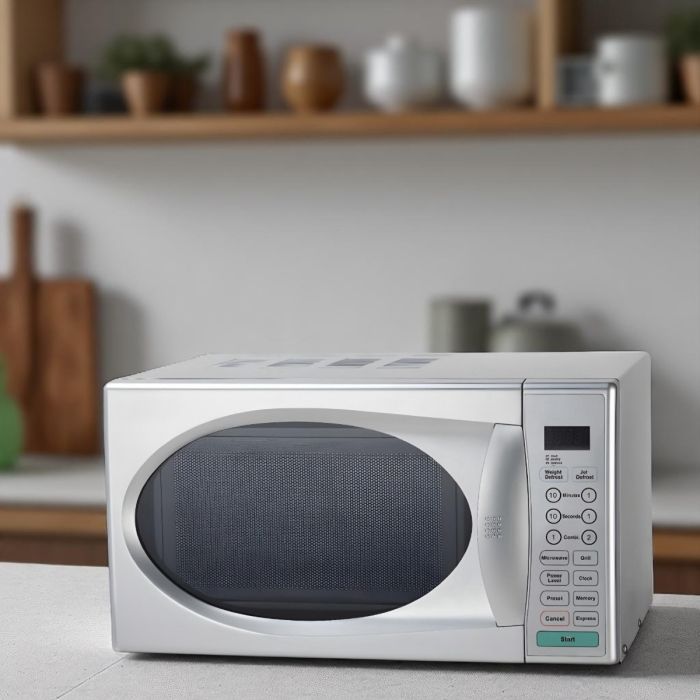 Silver twenty liter microwave and grill with eight power levels and speed defrost function