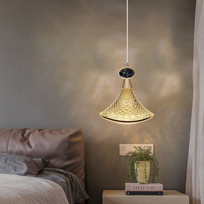 Gemelli Collections gold mesh cone pendant light with laser-cut metal pattern, smoked crystal accent, and luxury ceiling-mounted design creating decorative shadow effects for modern interiors.