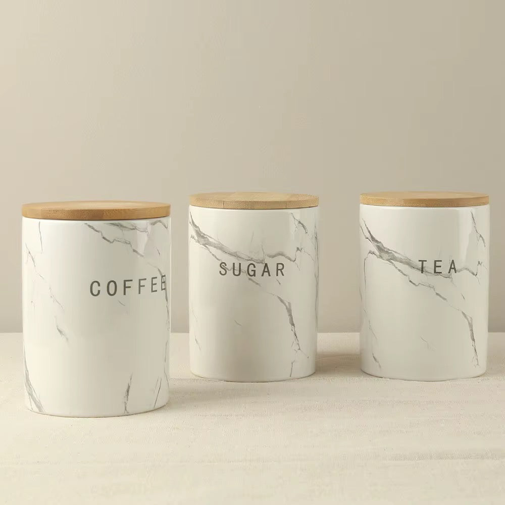 3-piece airtight ceramic canister set with bamboo lids for tea, sugar and coffee storage. Available in Nairobi, Kenya.
