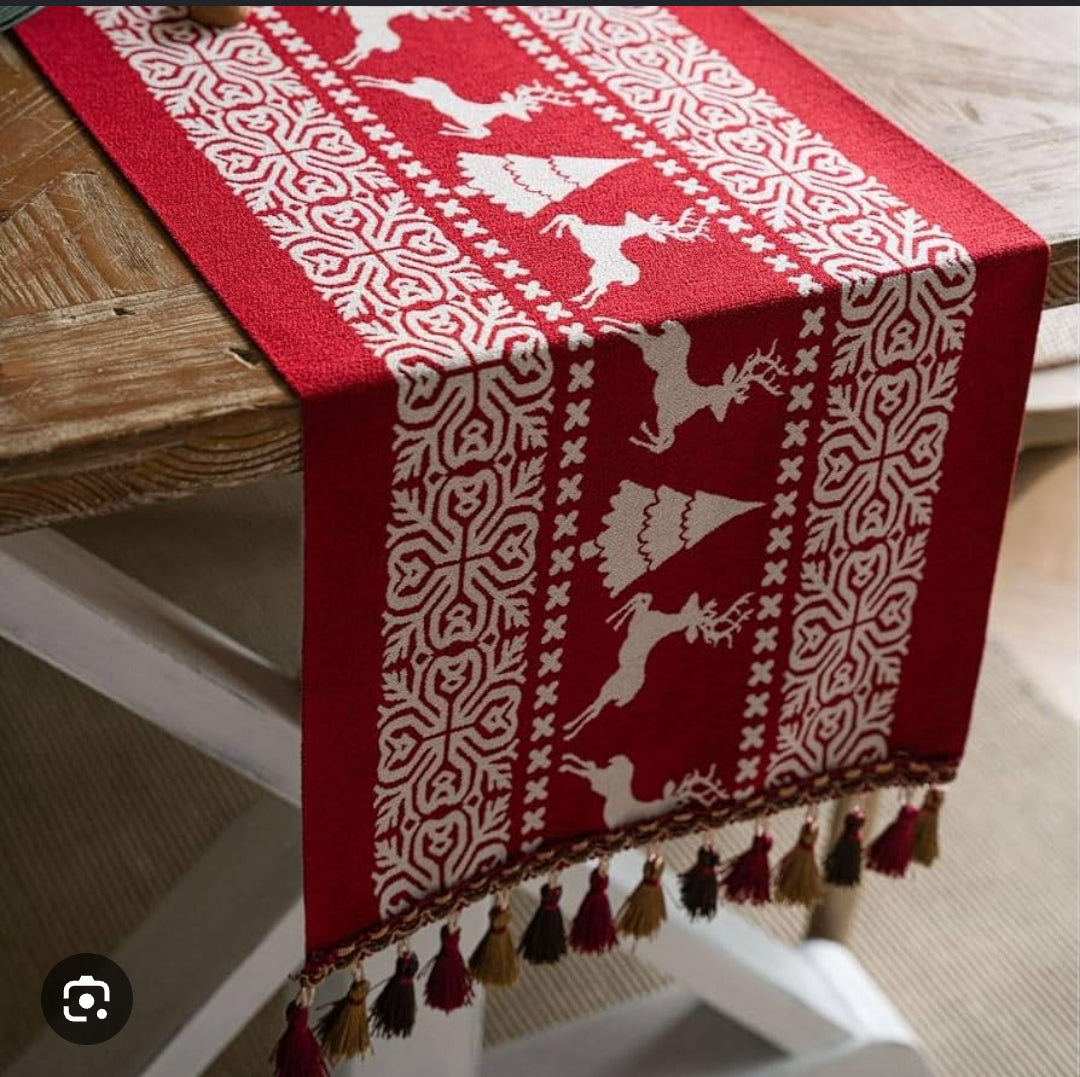 35 × 240cm: 35 × 240cm jacquard Christmas table runner with reindeer and snowman print and tassel edges available in Nairobi, Kenya