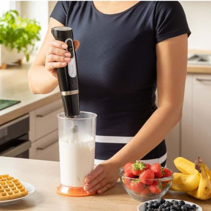 Sencor 800W hand blender set with beaker, chopper, and whisk.
