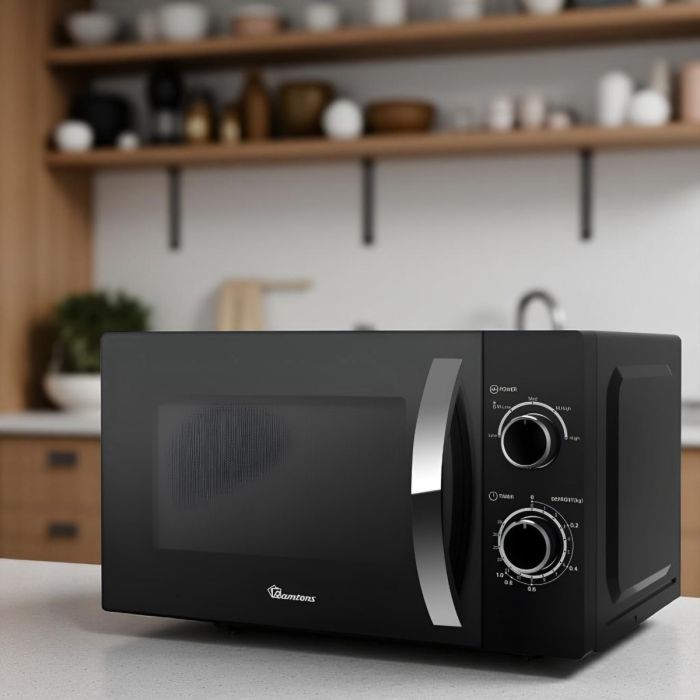 Twenty liter black manual microwave, model RM/557.