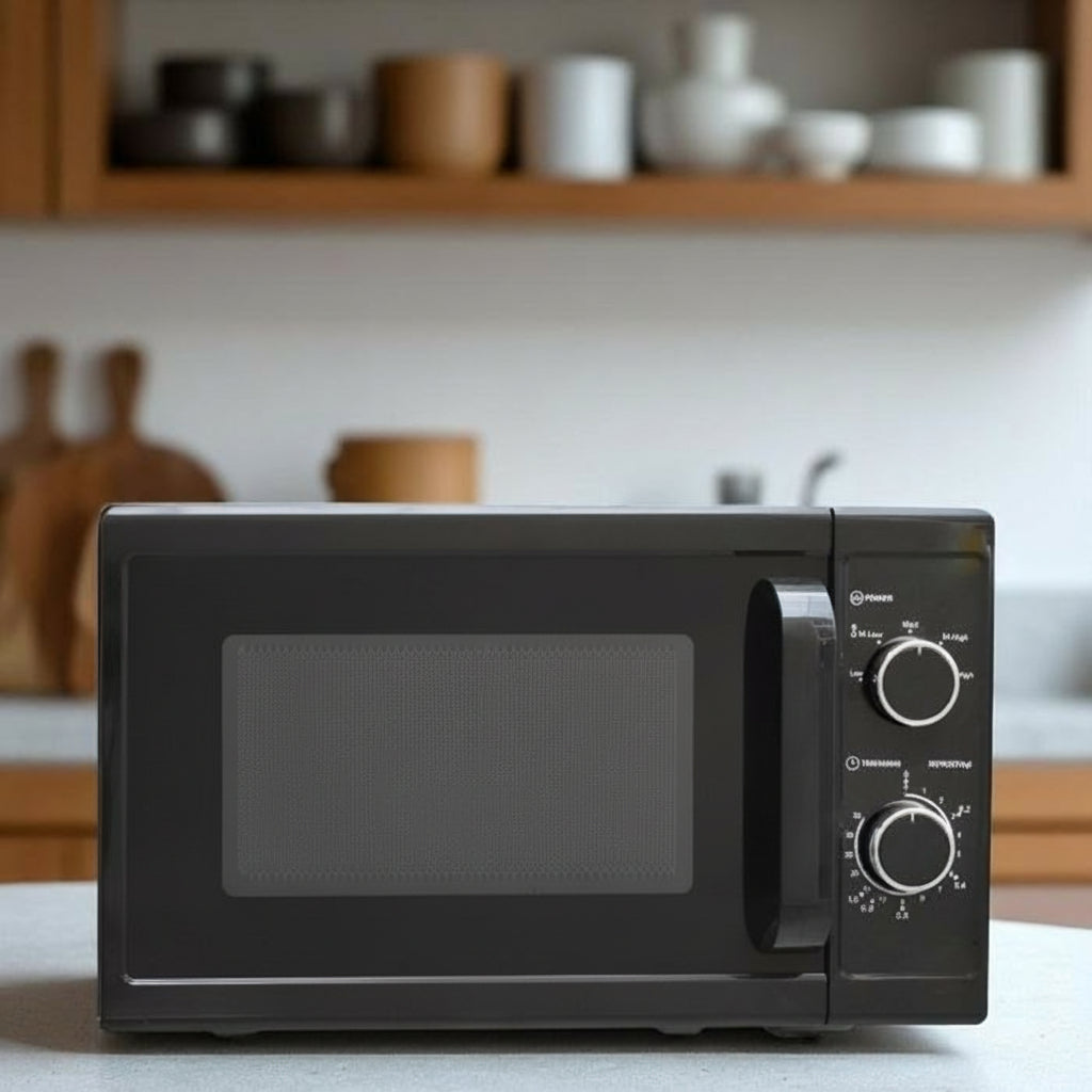 Twenty liter black manual microwave, model RM/672