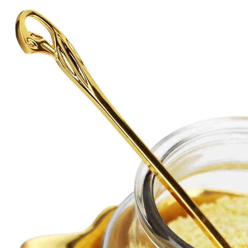 Gold/silver tea spoon