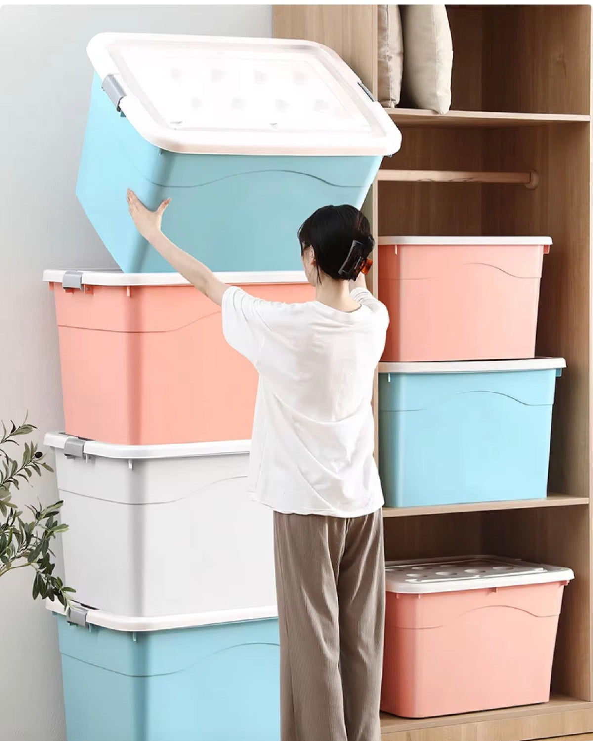 Large capacity plastic storage buckets in 80L, 120L, and 170L sizes used for organizing laundry, clothes, toys, and household items.