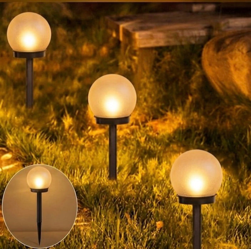 Solar garden lamps 6-piece set for outdoor pathways, gardens, lawns and patios.