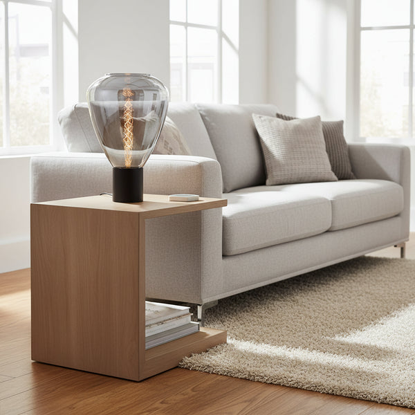 modern table lamp with smoky glass shade and matt black base for ambient lighting