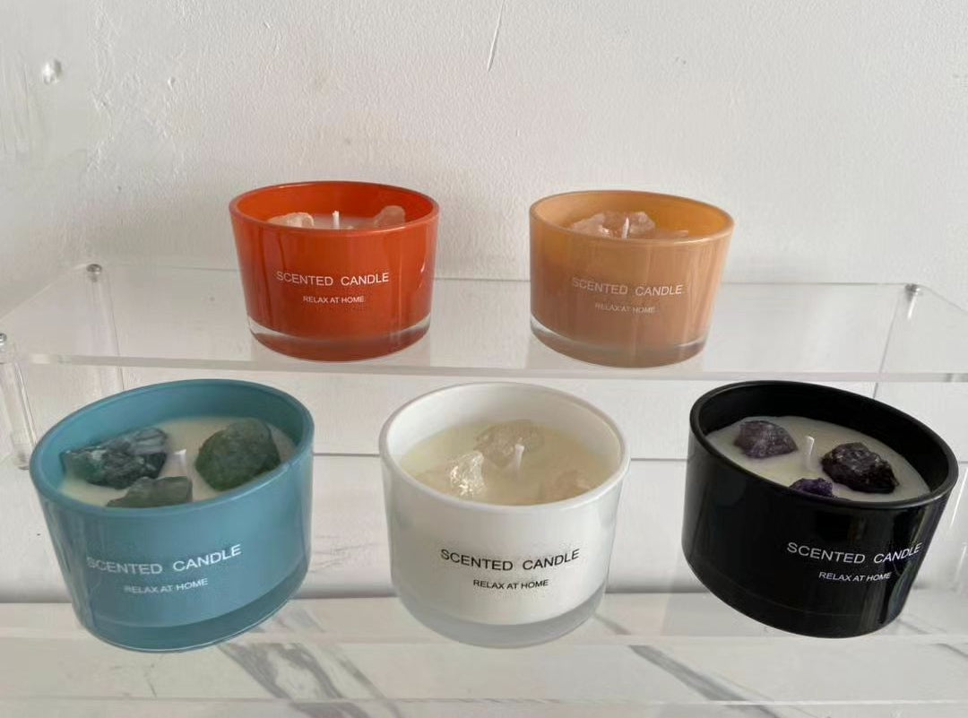 Scented candles with crystal stones