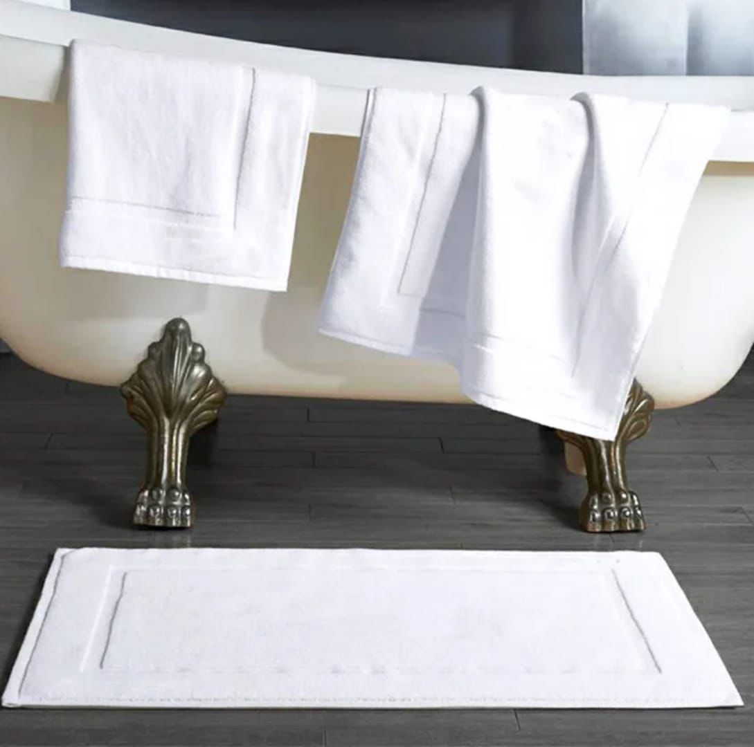 Gemelli Collections pure cotton bathroom mat measuring 50cm x 80cm for comfortable everyday bathroom use.
