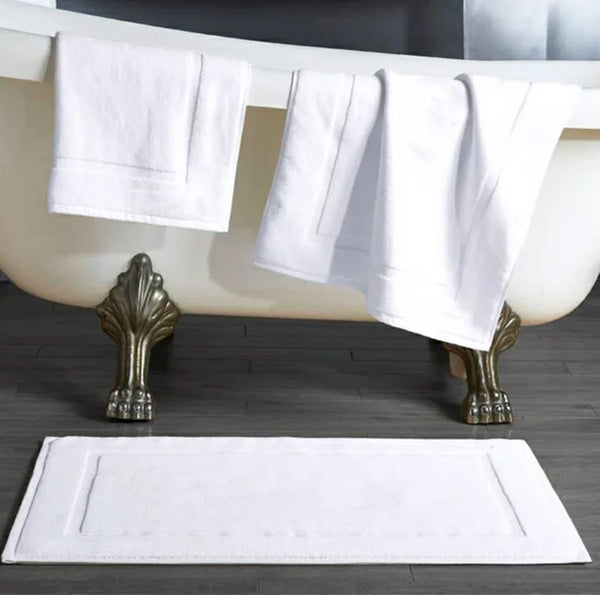 Gemelli Collections pure cotton bathroom mat measuring 50cm x 80cm for comfortable everyday bathroom use.