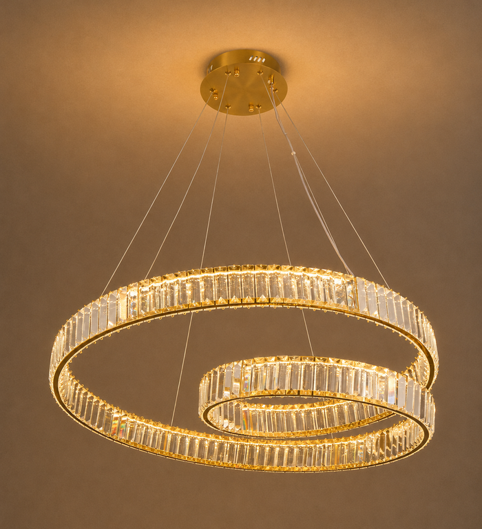 Gold double ring crystal pendant light with tri-colour 100W LED lighting, suspended crystal rings, and modern chandelier design for living rooms, dining rooms, hotels, reception areas, and luxury interiors WH 2602-GO-TC - Gemelli Collection