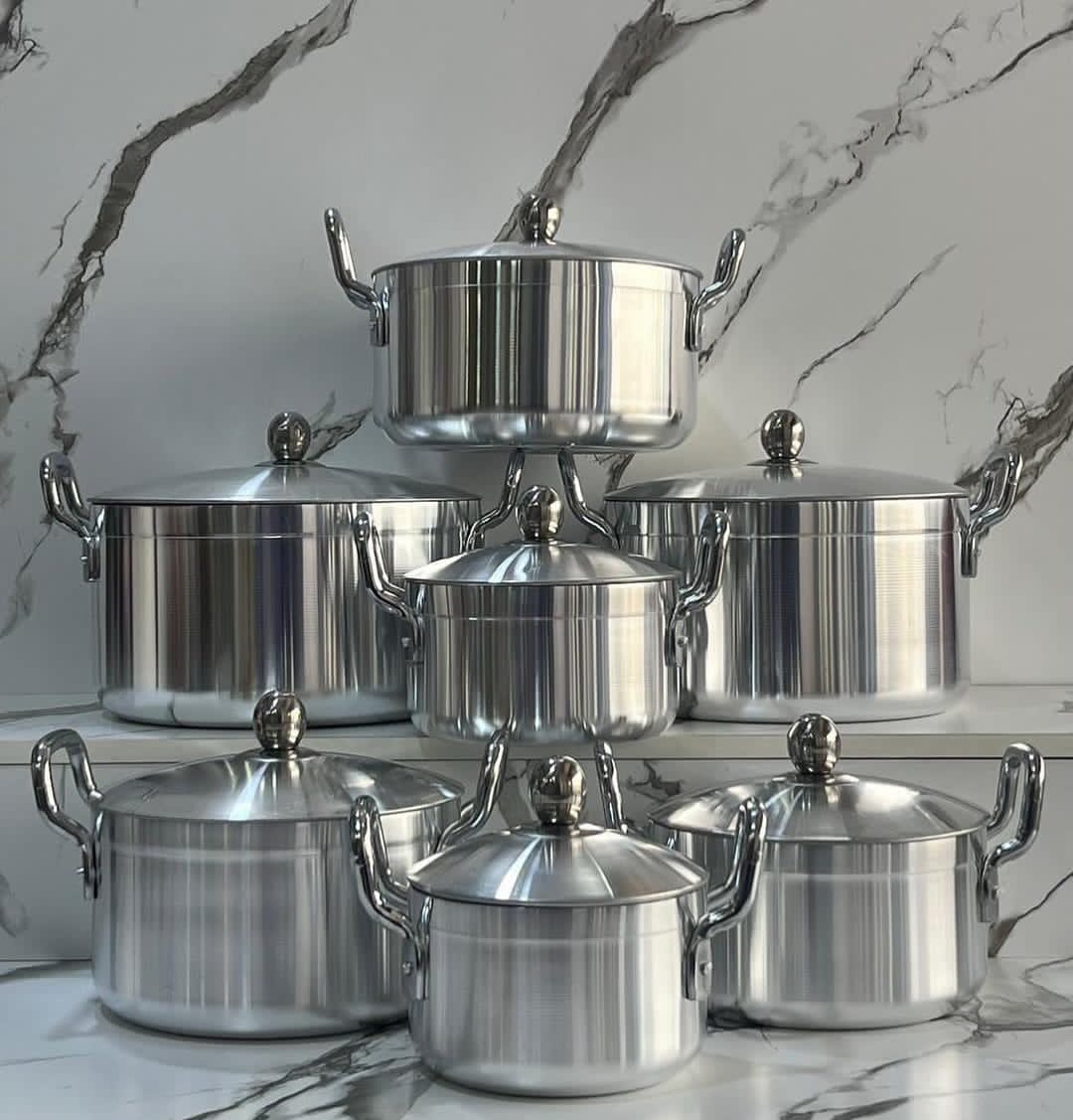 aluminum cookware set with 7 pots and 7 lids, assorted sizes