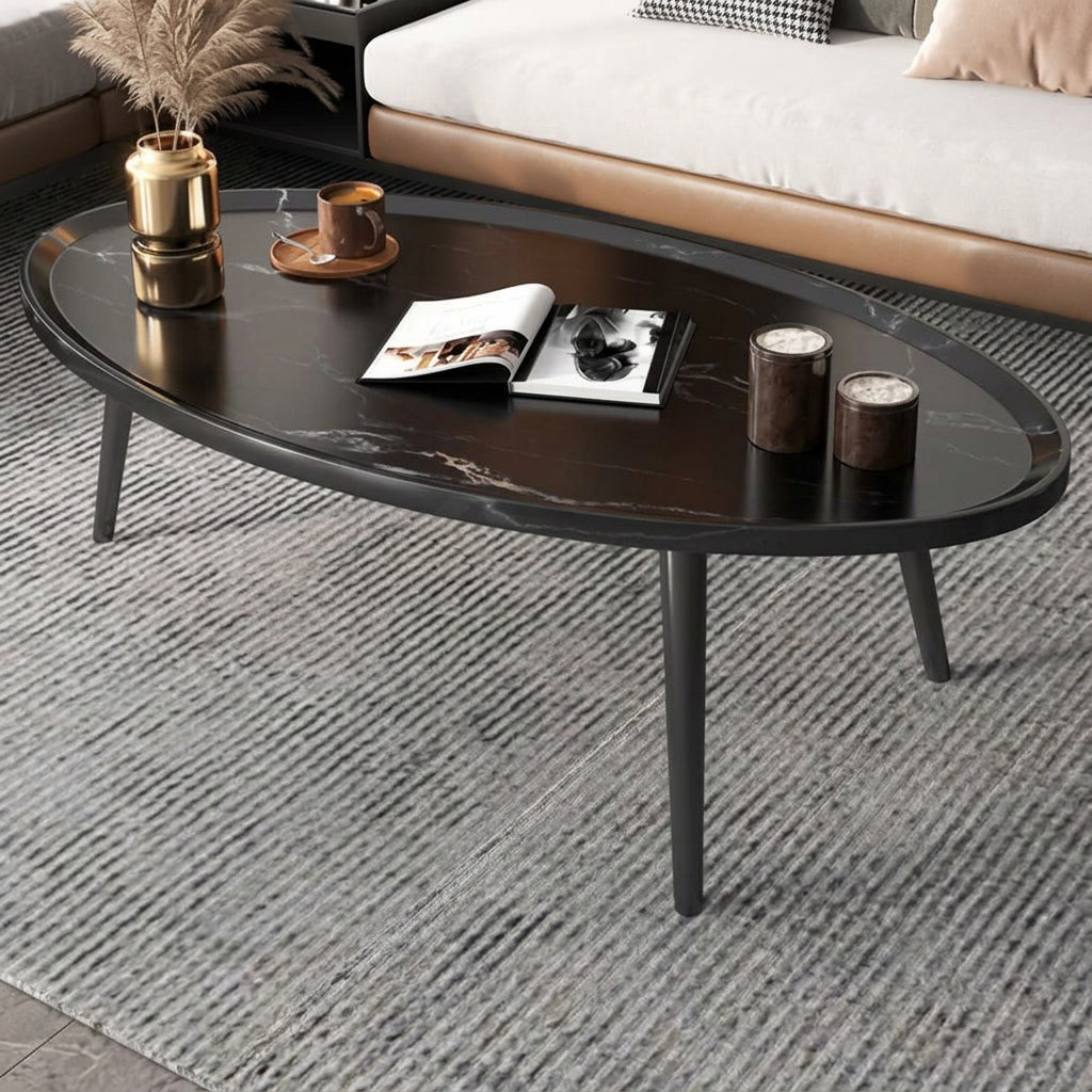Black oval wooden coffee table with solid wood legs measuring 80 × 55 × 38cm for living rooms and home offices, available in Nairobi, Kenya.