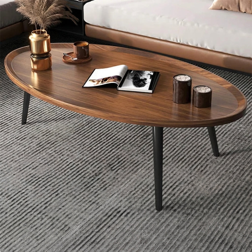 Brown oval wooden coffee table with solid wood legs measuring 80 × 55 × 38cm for living rooms and home offices, available in Nairobi, Kenya.