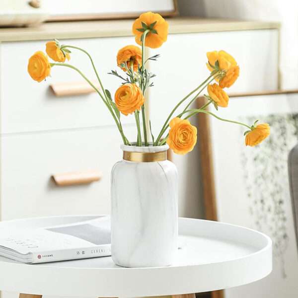 18cm marble-effect ceramic vase with gold rim, ideal for small to medium floral arrangements or standalone decor.