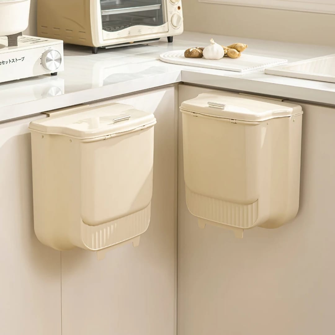 Cream collapsible wall-mounted trash bin for space-saving kitchen and home waste disposal, available in Nairobi, Kenya