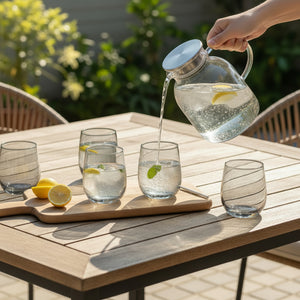 7-piece borosilicate glass jug set in smoky grey with 1800ml pitcher and six 300ml glasses, modern and durable design.