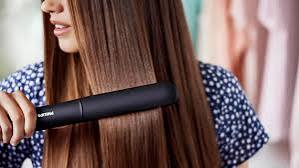 Gemelli Collections ThermoProtect hair straightener with keratin infused plates and two temperature settings designed for smooth straight hair styling with even heat distribution and reduced frizz.