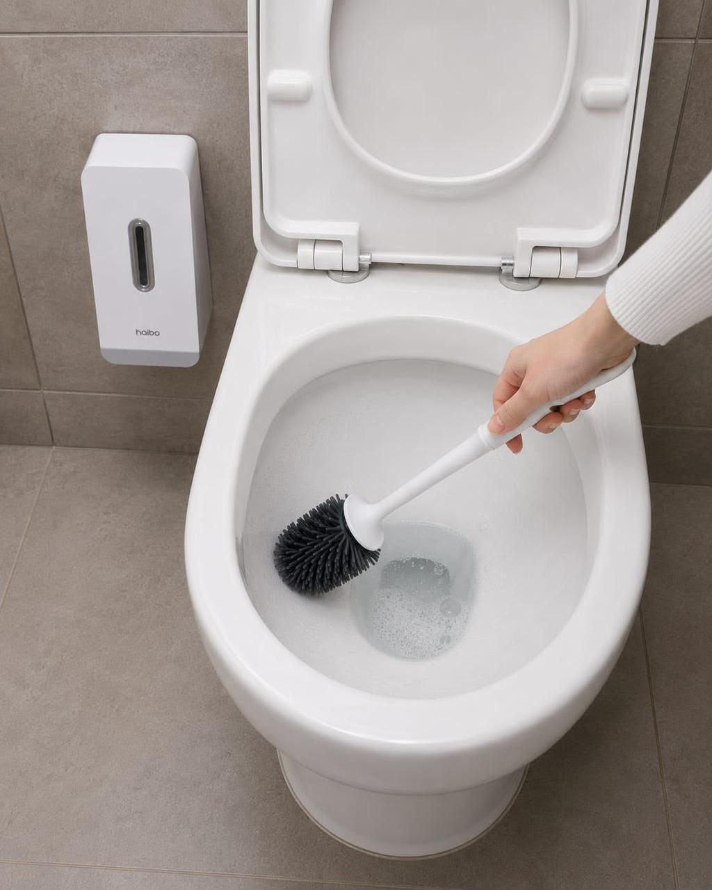 Long-handle toilet brush set with soft bristles and silicone wall-mounted holder, available in Nairobi, Kenya