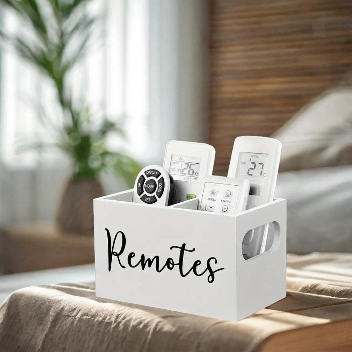 Remote control storage holder with multiple compartments for organising remotes phones stationery and everyday household accessories