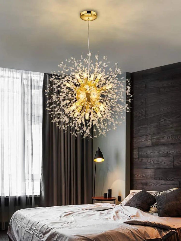 Gold dandelion crystal chandelier with radiating arms and sparkling K9 crystal buds creating a modern firework burst lighting effect.