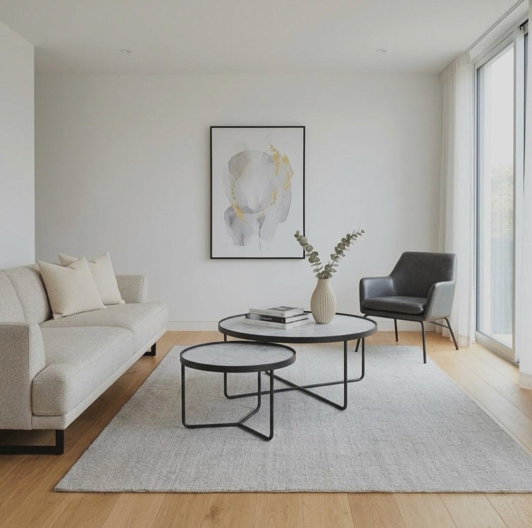 Gemelli Collections 2 piece nesting coffee table set with round wooden marble finish tops and sturdy black metal frames available in White and Black.