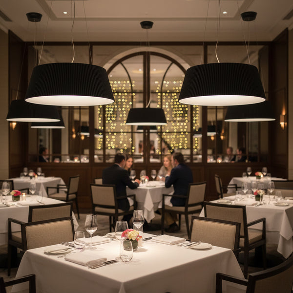 Textured black drum pendant light with white diffuser interior modern ceiling lighting for dining and kitchen spaces