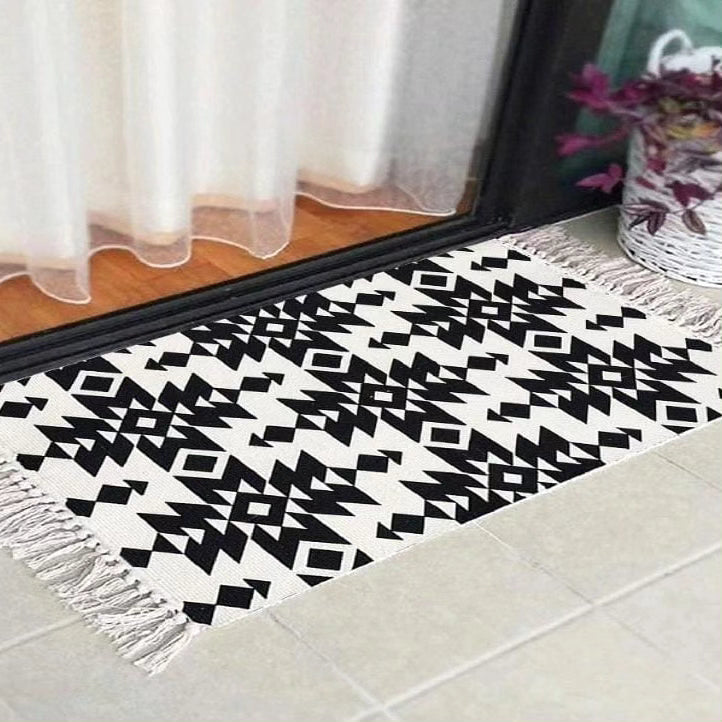 Boho handmade rug with decorative tassels available in 60 x 90cm and 60 x 130cm sizes for living rooms, bedrooms, entryways, and home décor