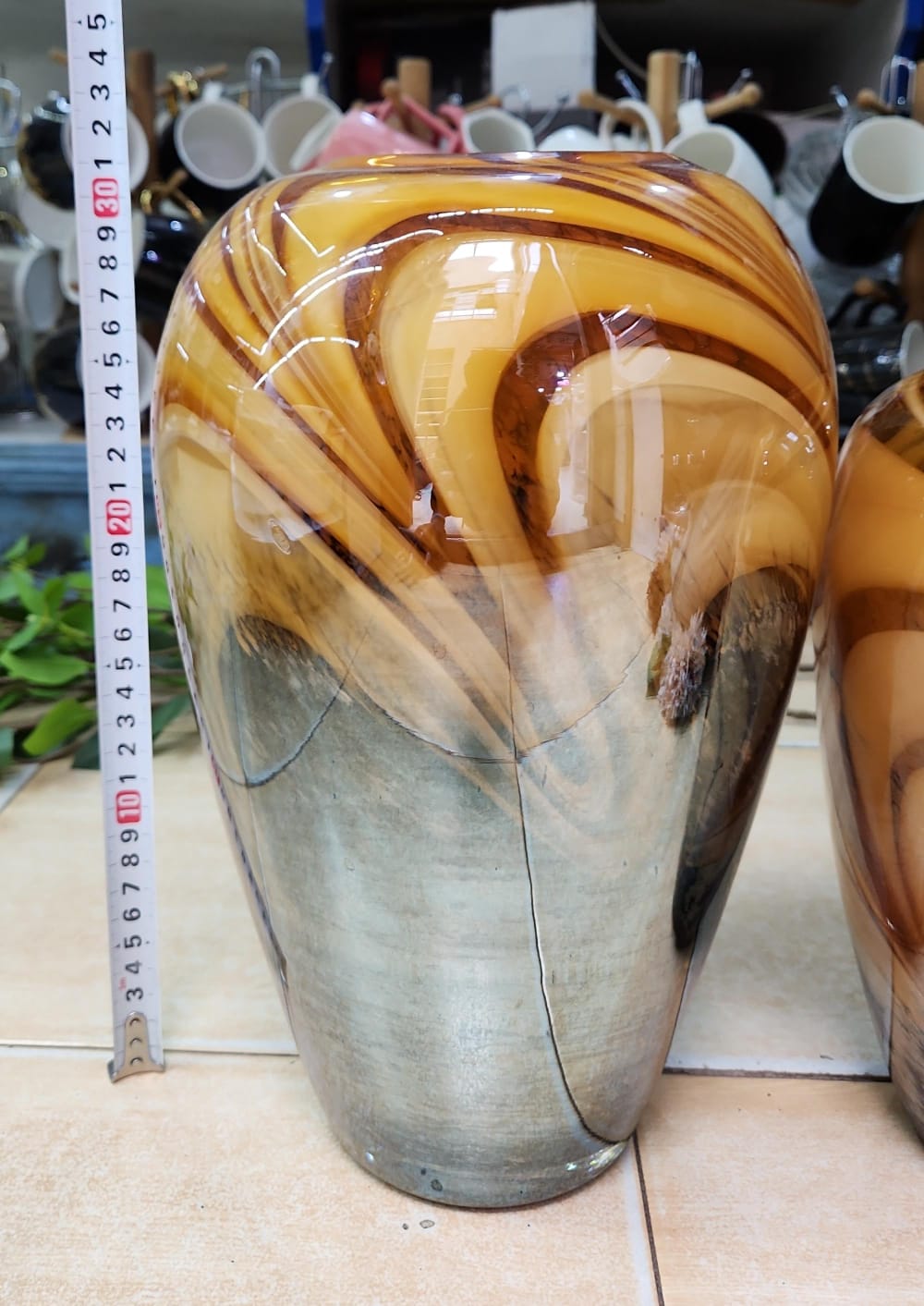 Handblown Amber Swirl Glass vase with caramel, brown, and smoke grey patterns