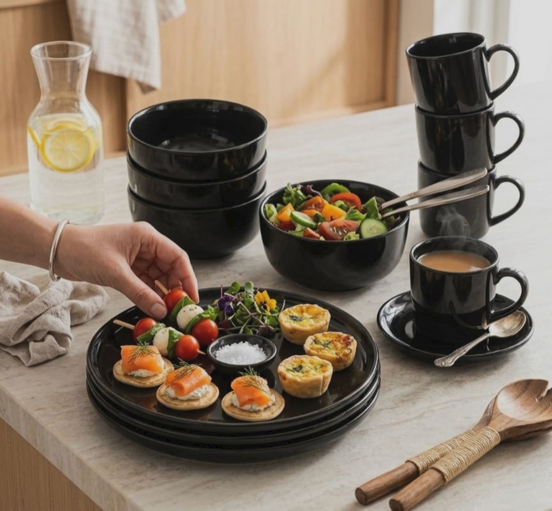 Gemelli Collections 18 piece black dinner set with 6 cups, 6 bowls and 6 platters for everyday dining and entertaining.