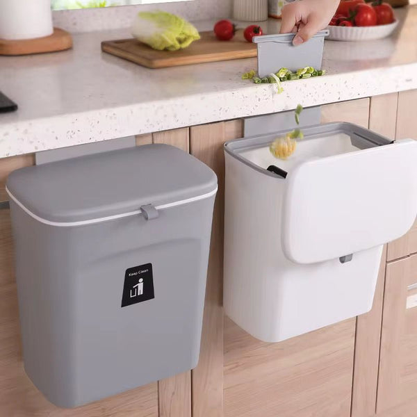 Wall-mounted kitchen trash can with lid in grey, space-saving design for small kitchens