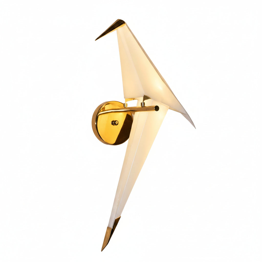 Gemelli Collections geometric origami bird wall sconce featuring a frosted white illuminated bird with polished gold accents, modern LED wall lamp for bedrooms, hallways, living rooms, hotels, and luxury interiors.