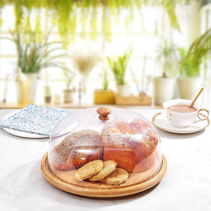 Fruit stand with clear acrylic dome cover and 30cm base for displaying and protecting fruits pastries snacks and other food items.