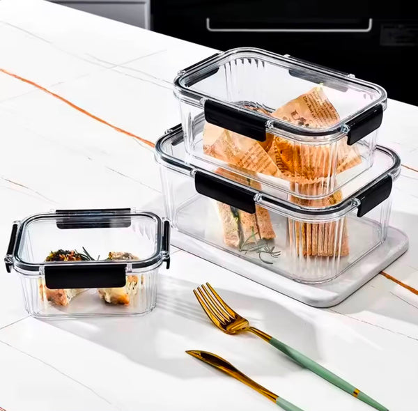 Crystal-clear airtight acrylic food storage containers with 4-side locking lids, available in 0.5L, 1.8L and 2.5L capacities.