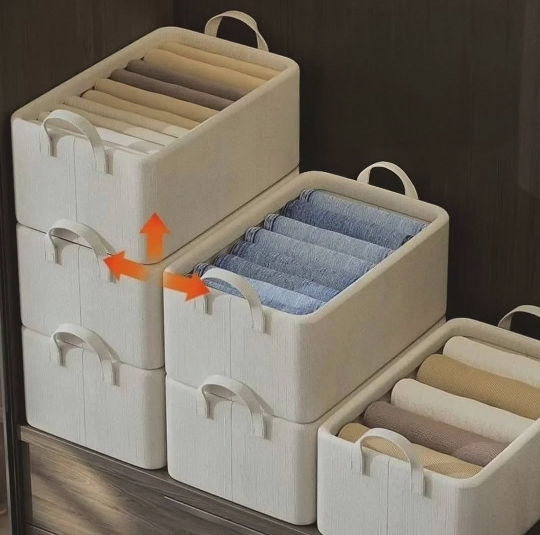 Foldable multipurpose organiser with fabric construction sturdy handles washable ventilated design for jeans clothing accessories towels toys and wardrobe storage.