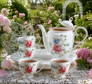 Porcelain tea set with rose pattern including teapot six cups and rotating serving tray elegant floral tea service set for home entertaining and tea parties.