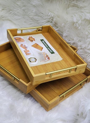 3-piece bamboo serving tray set in different sizes with gold handles for serving food, drinks and organising items