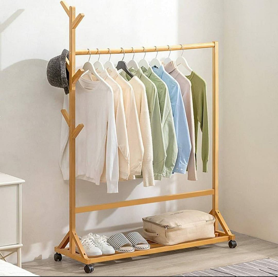 Bamboo clothes rack with strong and durable construction, designed for hanging and organising clothes in bedrooms, dressing areas, and laundry rooms