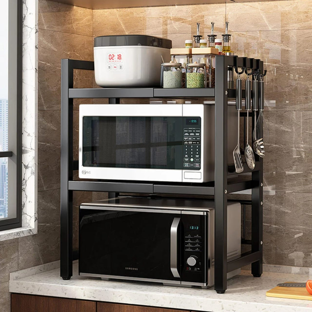 2 tier expandable metallic microwave stand with adjustable width for kitchen countertop storage appliance organisation and pantry shelving.