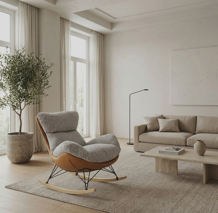 Gemelli Collections ergonomic rocking lazy sofa lounge chair with grey fabric cushioning, tan leather shell, black steel frame and wooden runners.