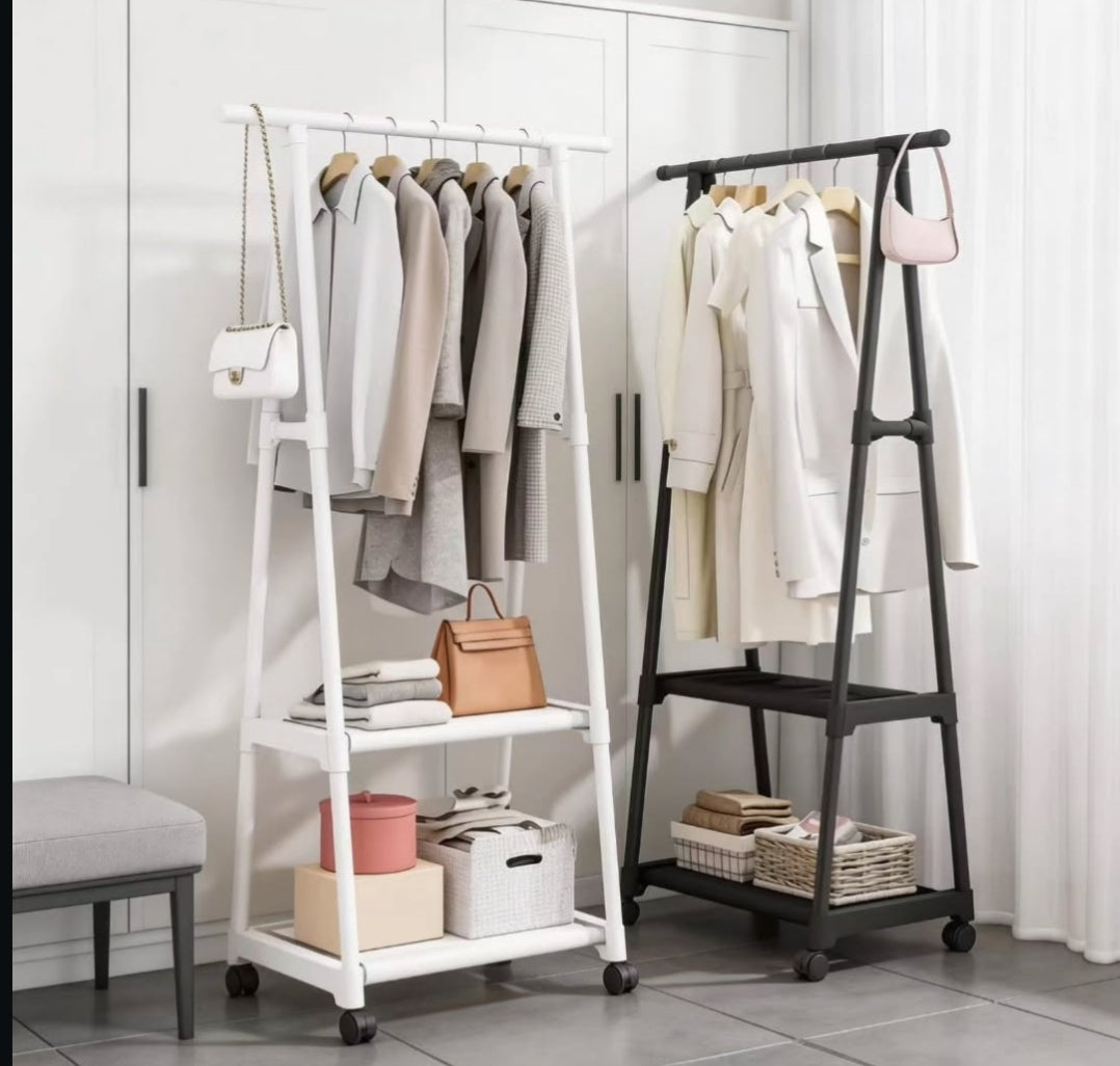 Gemelli Collections Floor-To-Ceiling Clothes Rack, adjustable vertical garment organiser with multiple hanging rails for bedroom and wardrobe storage.