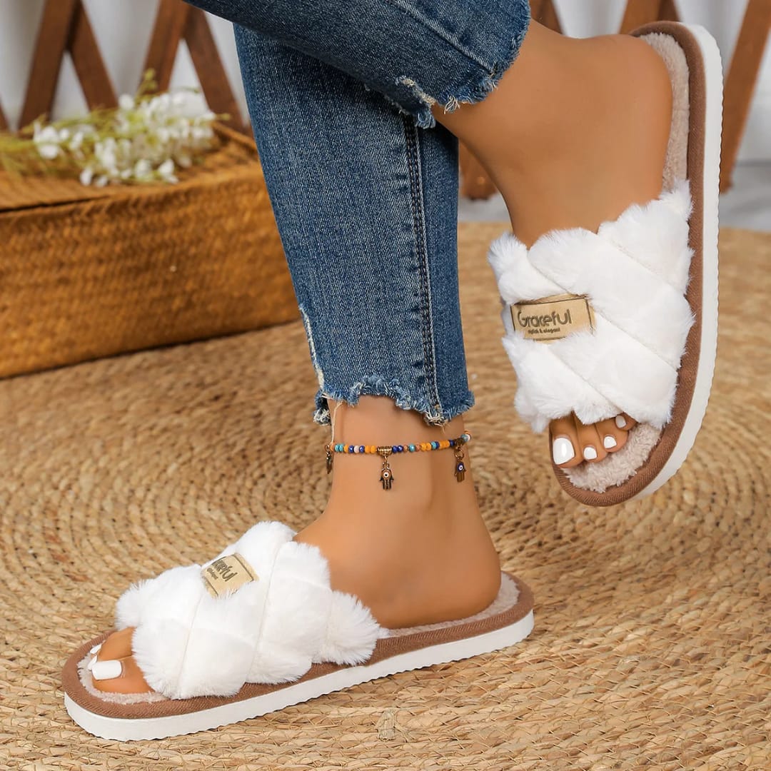 Fluffy open toe slippers with soft plush upper and non-slip flat sole available in sizes 38-39 40-41 and 42-43 for comfortable indoor home wear.