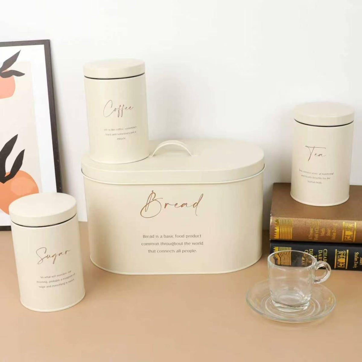 4-piece quilted metal kitchen bread bin and canister set with airtight lids, rope handle, and labelled Coffee, Sugar, and Tea containers for pantry storage