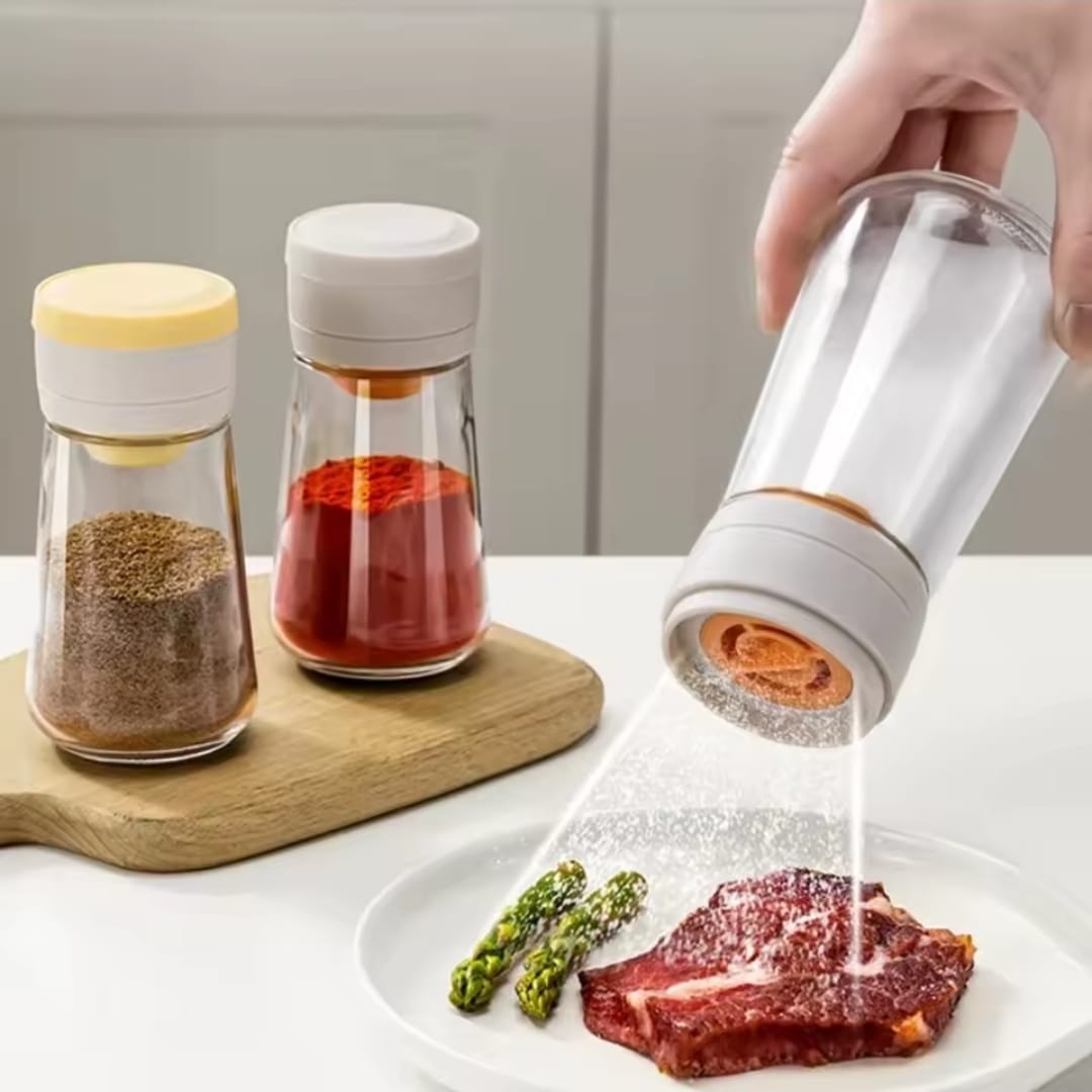 moisture-proof glass salt shaker with precise measure dispenser for cooking seasoning and dining table use easy-pour salt container with controlled dispensing and modern kitchen design.