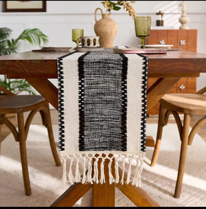 Boho cotton table runner with wide stripe design and knitted tassels for elegant home décor and dining table styling