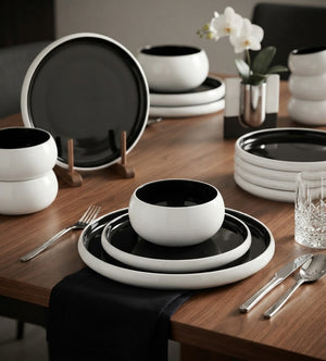 Gemelli Collections 24 piece black and white double glaze ceramic dinner set with dinner plates side plates salad pasta bowls and soup bowls.