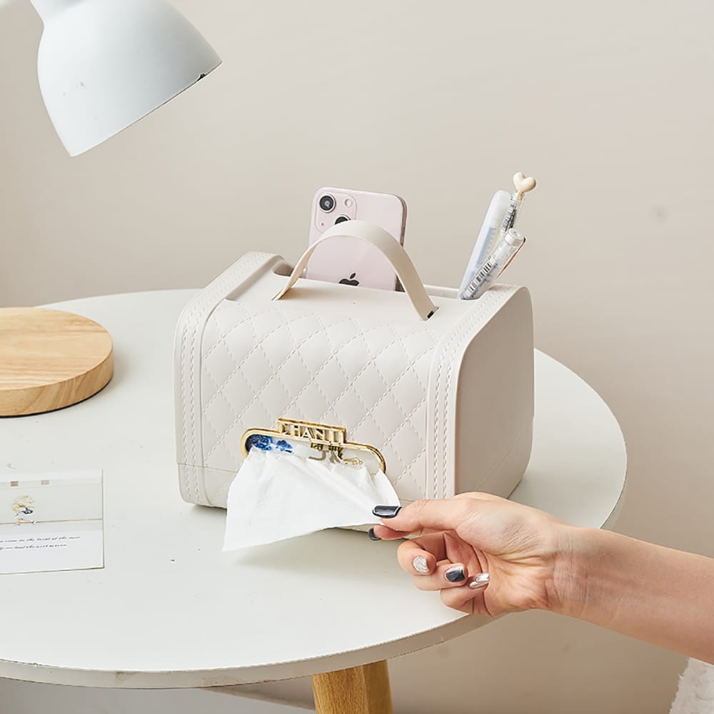 3-slot serviette holder in green and white with separate compartments for organising napkins and table essentials.