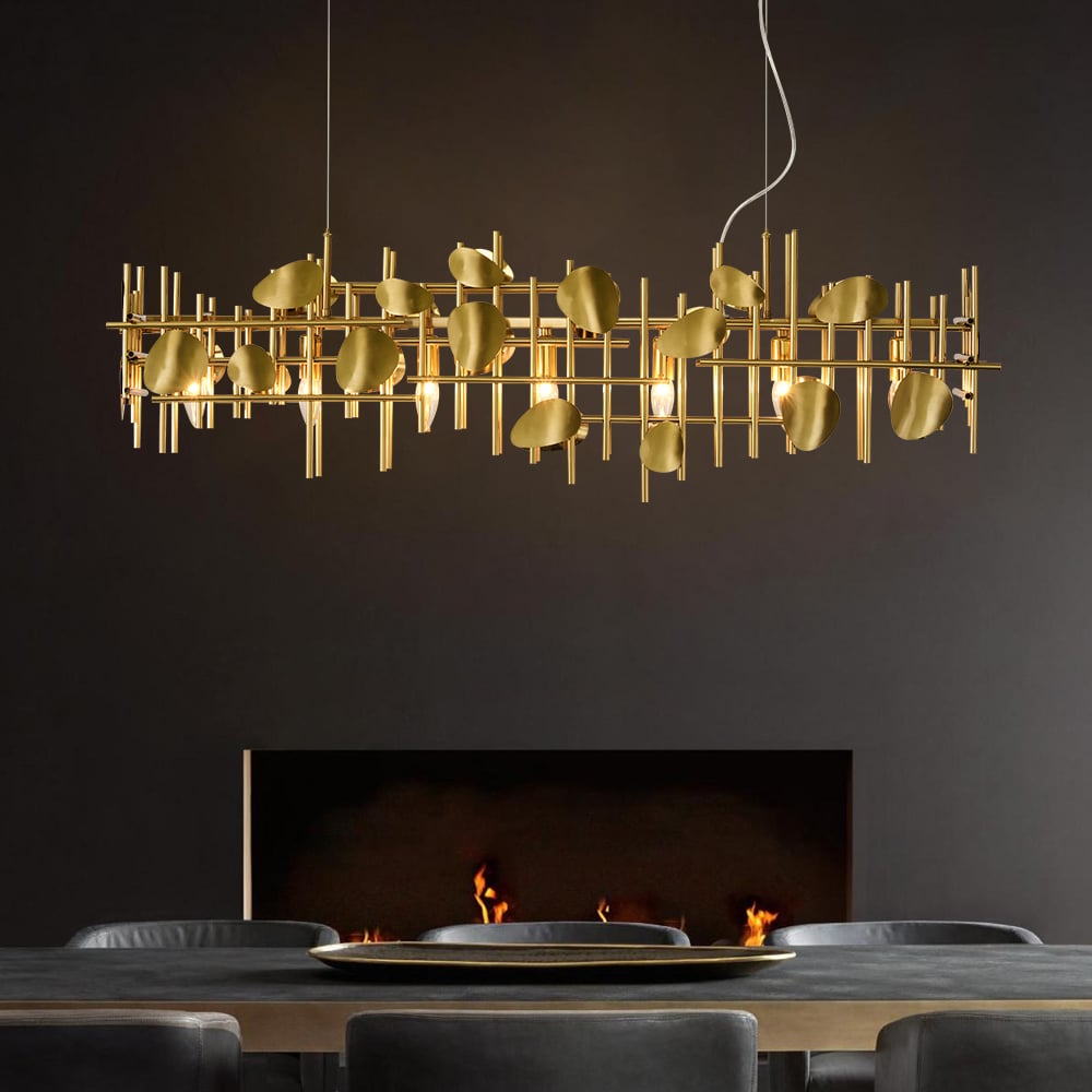 Linear sculptural brass grid chandelier with floating rods and irregular brass discs and hidden LED bulbs creating warm ambient luxury lighting.